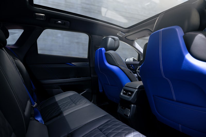 Back Seat View of the 2026 OPTIQ-V Blue Front Seats, Sun Roof, and Interior | Jessup Cadillac in CATHEDRAL CITY CA
