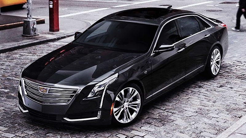 Black Cadillac CT6 parked on the street on a snowy day