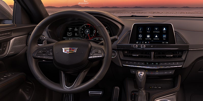 Interior design of the steering wheel and center console from a Cadillac CT4-V